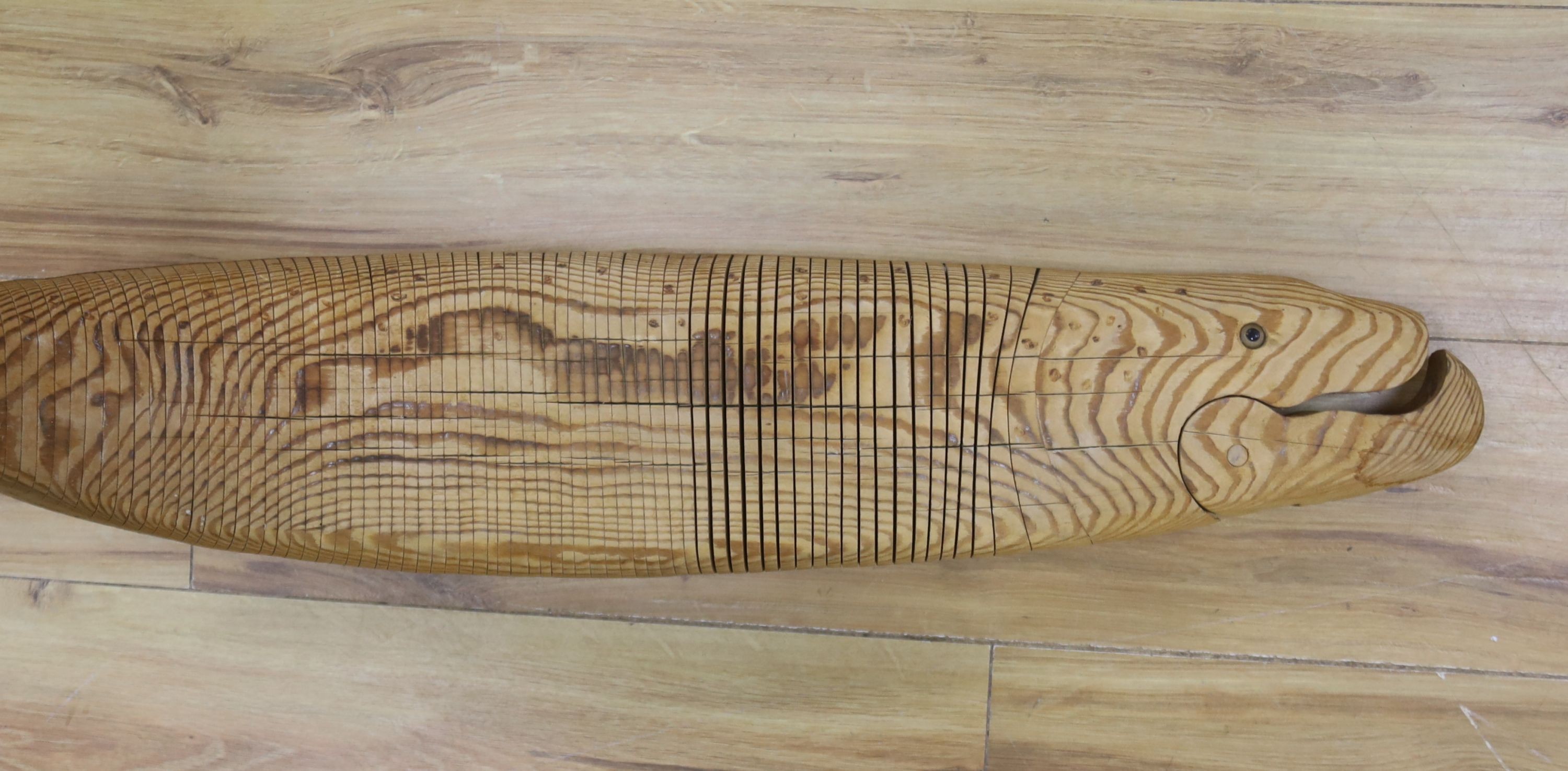 A large articulated pine model of a pike, 98cm